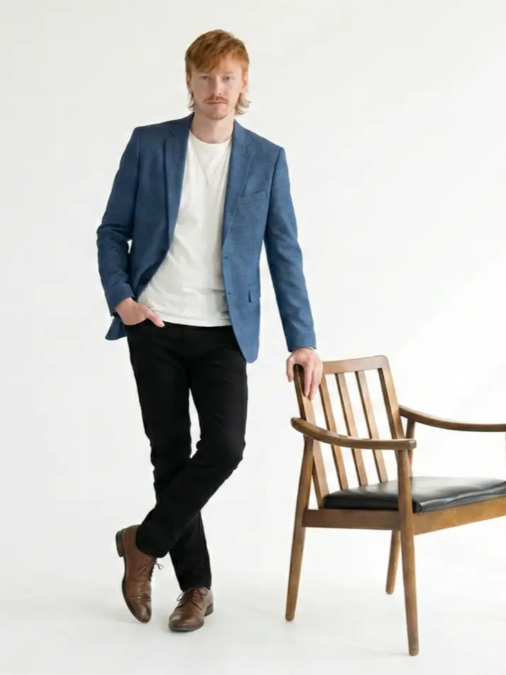 Jeffrey Helder leaning on chair