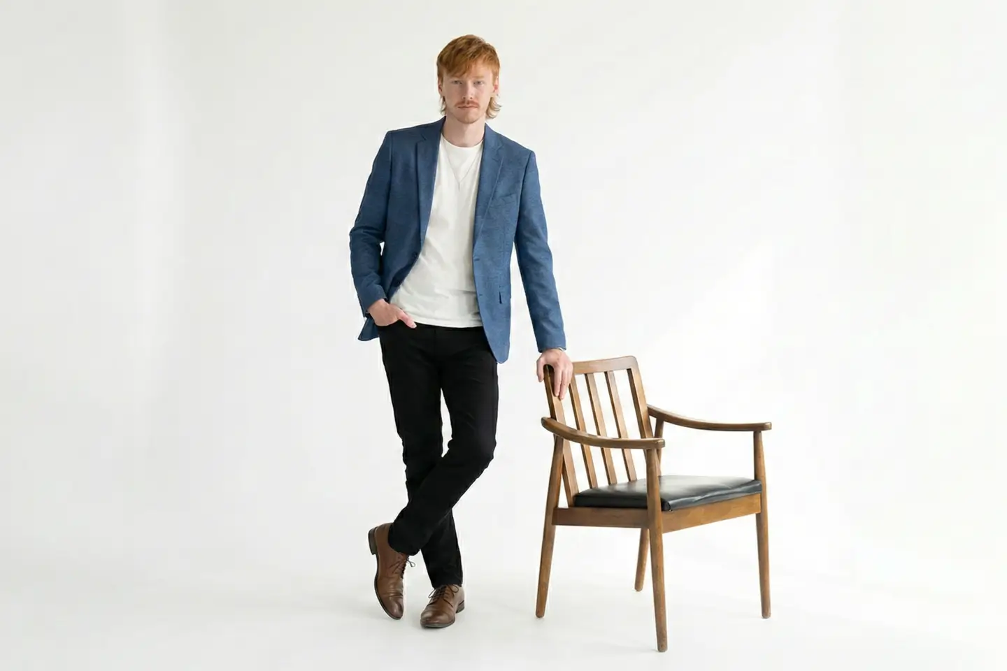 Jeffrey Helder leaning on chair